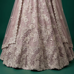 Lavender lehenga skirt with dense silver embroidery and pearl-like beadwork