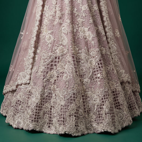Lavender lehenga skirt with dense silver embroidery and pearl-like beadwork