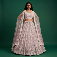 Lavender embellished lehenga with matching lace-work blouse and sheer dupatta drape