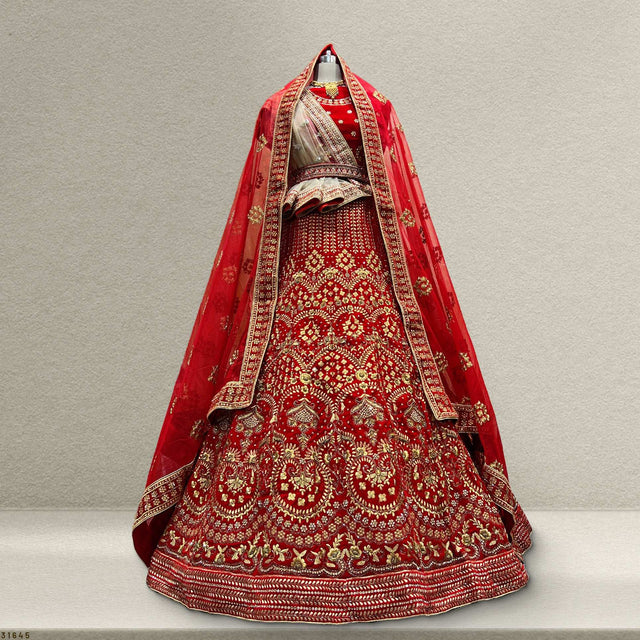 Royal red bridal lehenga with ornate gold embroidery and double bordered dupatta