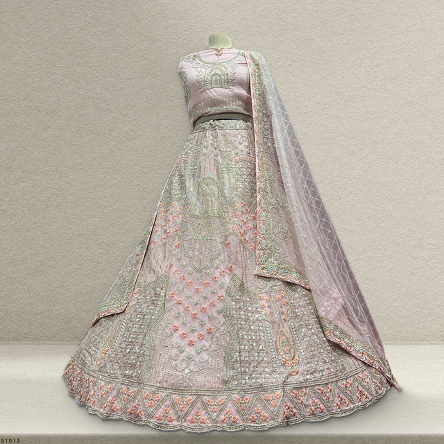 Light pink modern lehenga set with ornate silver embroidery and sheer matching dupatta