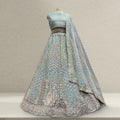 Sky blue lehenga with silver embroidery, floral motifs, and matching sheer dupatta