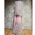 Blush pink georgette saree with gold resham and sequin vertical motifs, ornate border