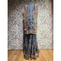 Slate blue organza saree with multicolour resham embroidery and ornate floral border