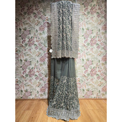 Grey georgette saree with silver stone floral border and fringe trim