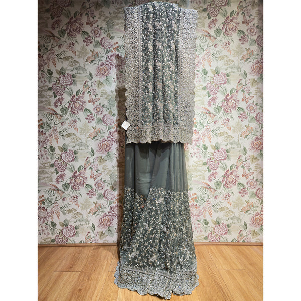 Grey georgette saree with silver stone floral border and fringe trim