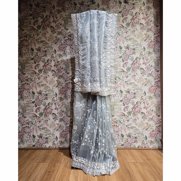 Silver grey organza saree with cut-dana & sequin work, decorative hem border