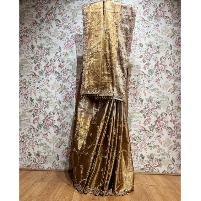 Gold and dark bronze viscose-silk saree with cut dana beadwork and lace trim