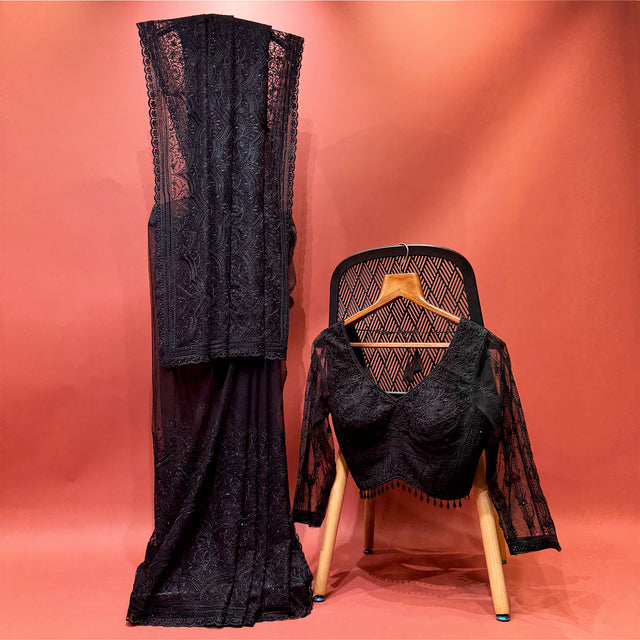 Navy net saree with dhaga and stonework; matching stitched blouse set