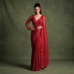 Red net cocktail saree with full-sleeve stitched blouse, V-neck, intricate border work