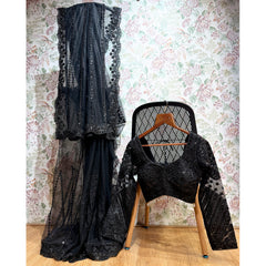 Black net saree with sequined detailing and matching stitched blouse, sheer dark drape