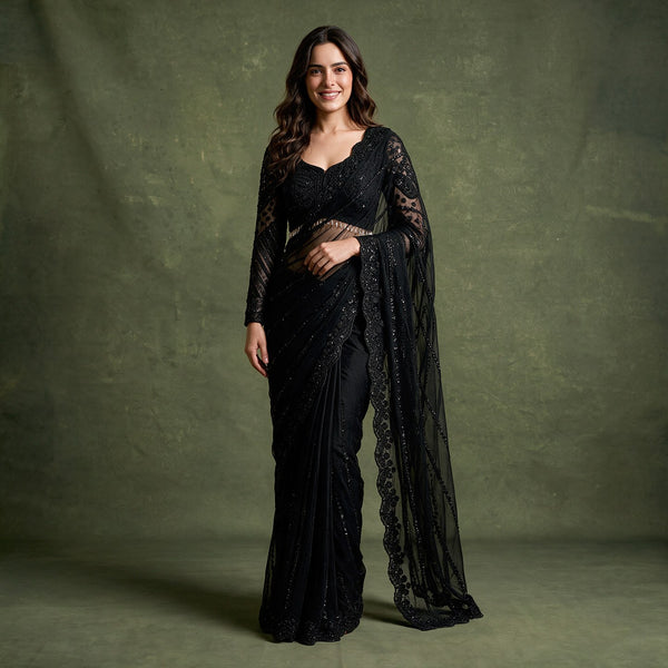 Black net cocktail saree with beaded full-sleeve blouse, draped side and sheer border