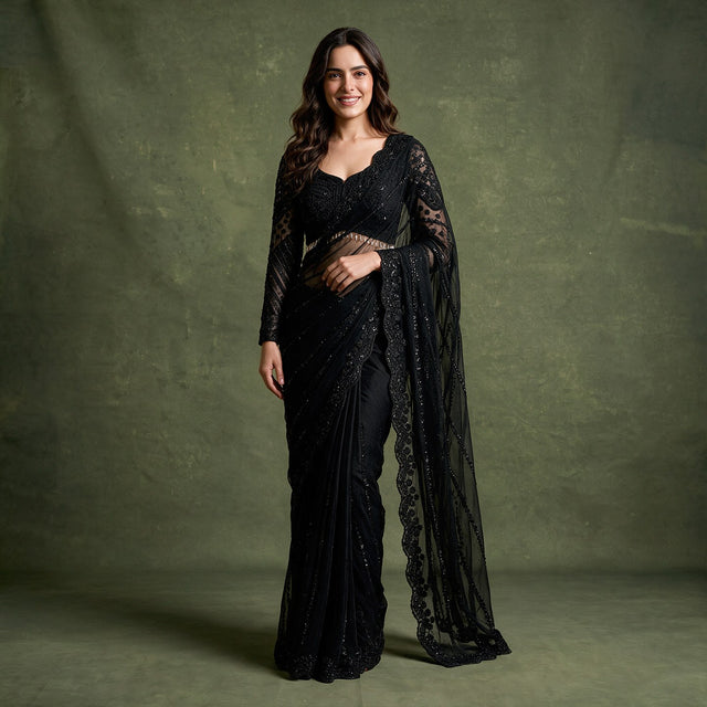 Black net cocktail saree with beaded full-sleeve blouse, draped side and sheer border