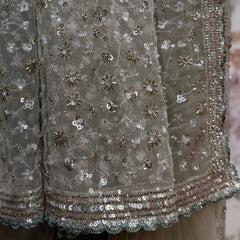Grey net saree fabric with cut dana and sequin floral motifs, scalloped sequin border