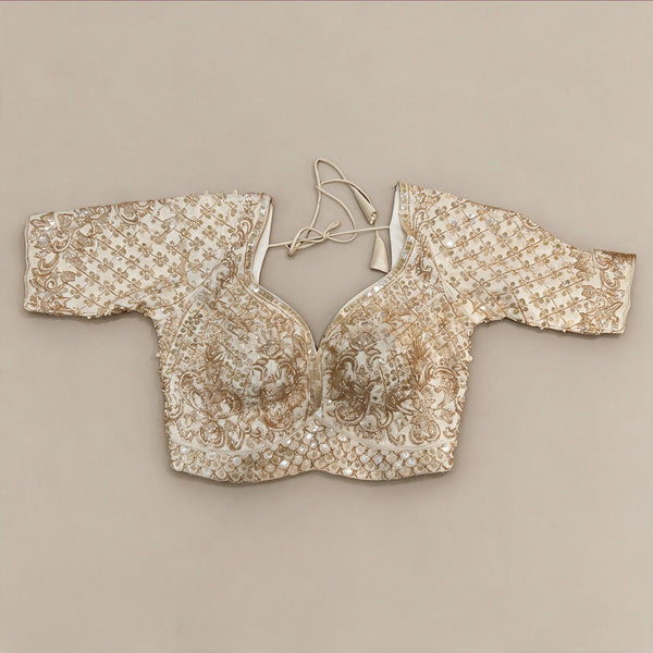 Heavy gold handwork blouse with flower lattice and embroidered neckline