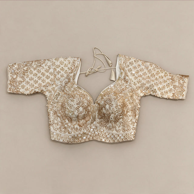 Heavy gold handwork blouse with flower lattice and embroidered neckline