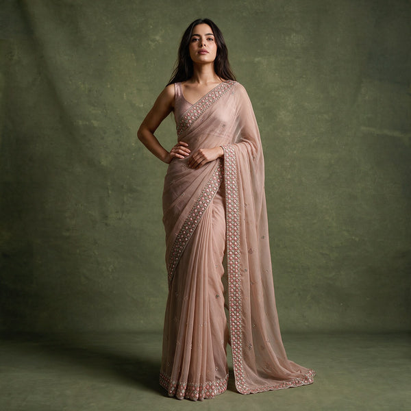 Dusty rose chiffon saree with cutdana and beadwork border, embellished pallu