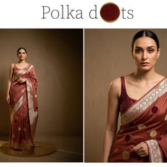 Rust-red viscose silk saree with velvet polka dots and light border, worn with blouse