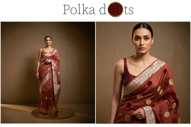 Rust-red viscose silk saree with velvet polka dots and light border, worn with blouse