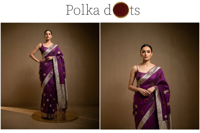 Purple saree with velvet-like polka dots, silver border, and graceful draped pallu