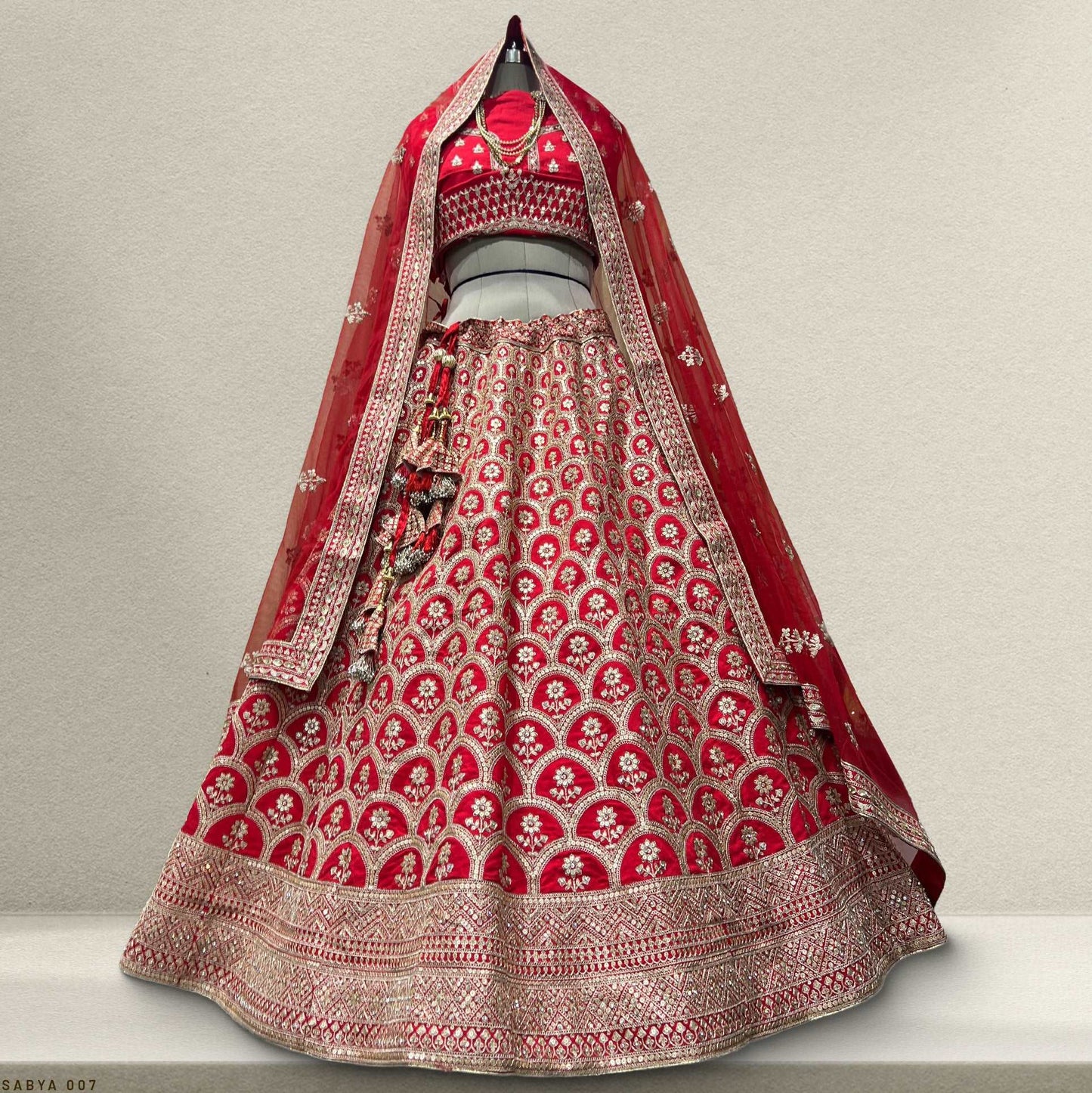 Dulhan in Red Lehenga Elegance: Sabyasachi-Inspired Royal Baggi Collection JMS Studio {{ Royal Red Bridal Lehenga}}