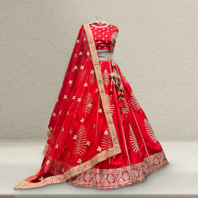 Red bridal lehenga with gold border, flared skirt and matching embellished blouse