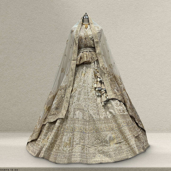 Dulhan in Ivory Lehenga Elegance: Celebrity-Inspired Royal Baggi Collection