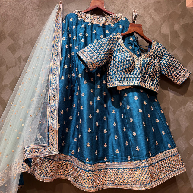 Royal blue designer lehenga set with embroidered blouse and sheer dupatta