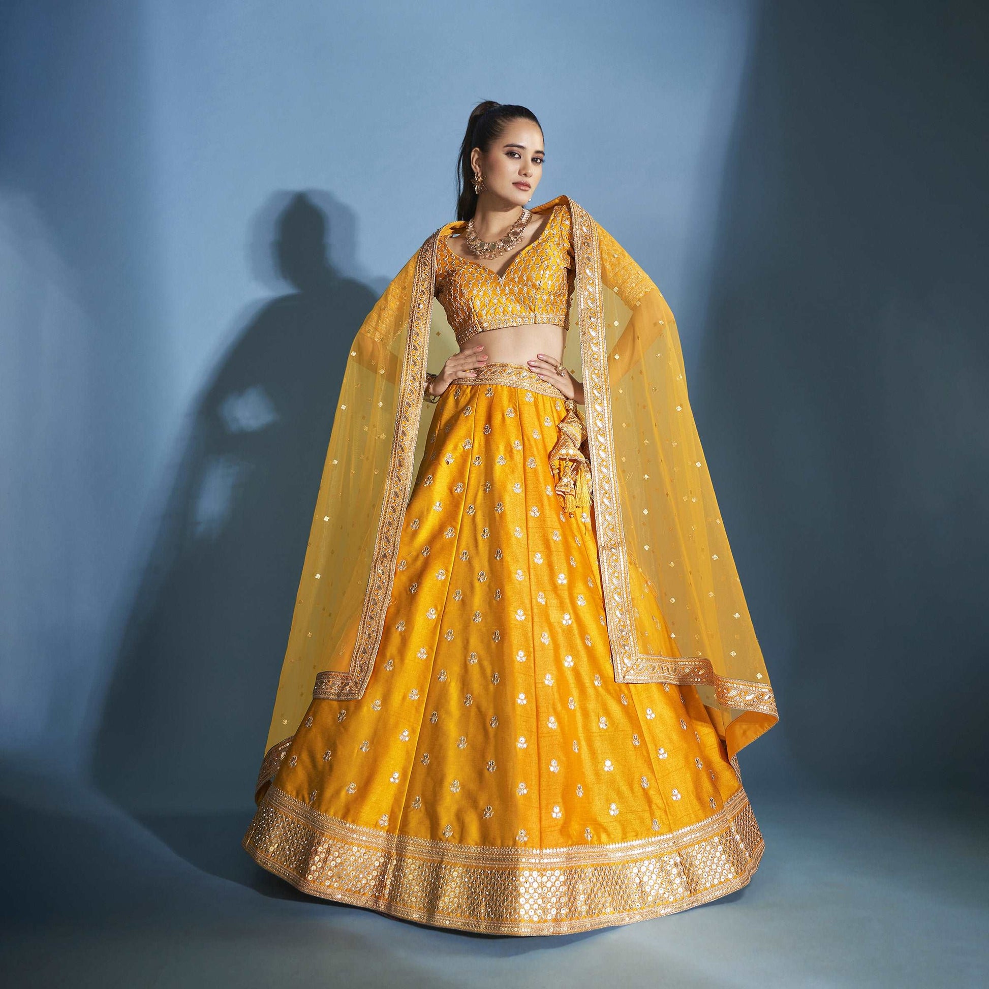 Booti Work Raw Silk Haldi Lehenga: Sabyasachi-Inspired Royal Baggi Collection JMS Studio {{ Royal Red Bridal Lehenga}}