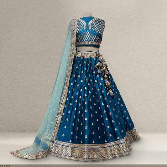 Booti Work Raw Silk Blue Lehenga: Sabyasachi-Inspired Royal Baggi Collection JMS Studio {{ Royal Red Bridal Lehenga}}