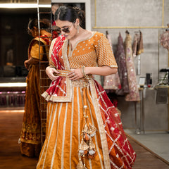 Dulhan in Gold Bridal Lehenga: Celebrity-Inspired Royal Baggi Collection JMS Studio {{ Royal Red Bridal Lehenga}}