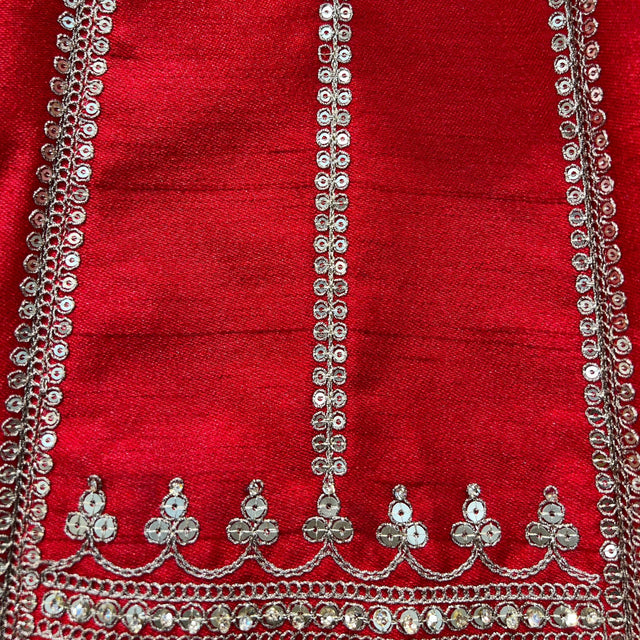 Red lehenga border with vertical silver chains and scalloped bead trim