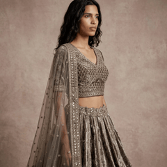 Velvet lehenga set with sheer dupatta, sequined border, and mirrorwork skirt panels