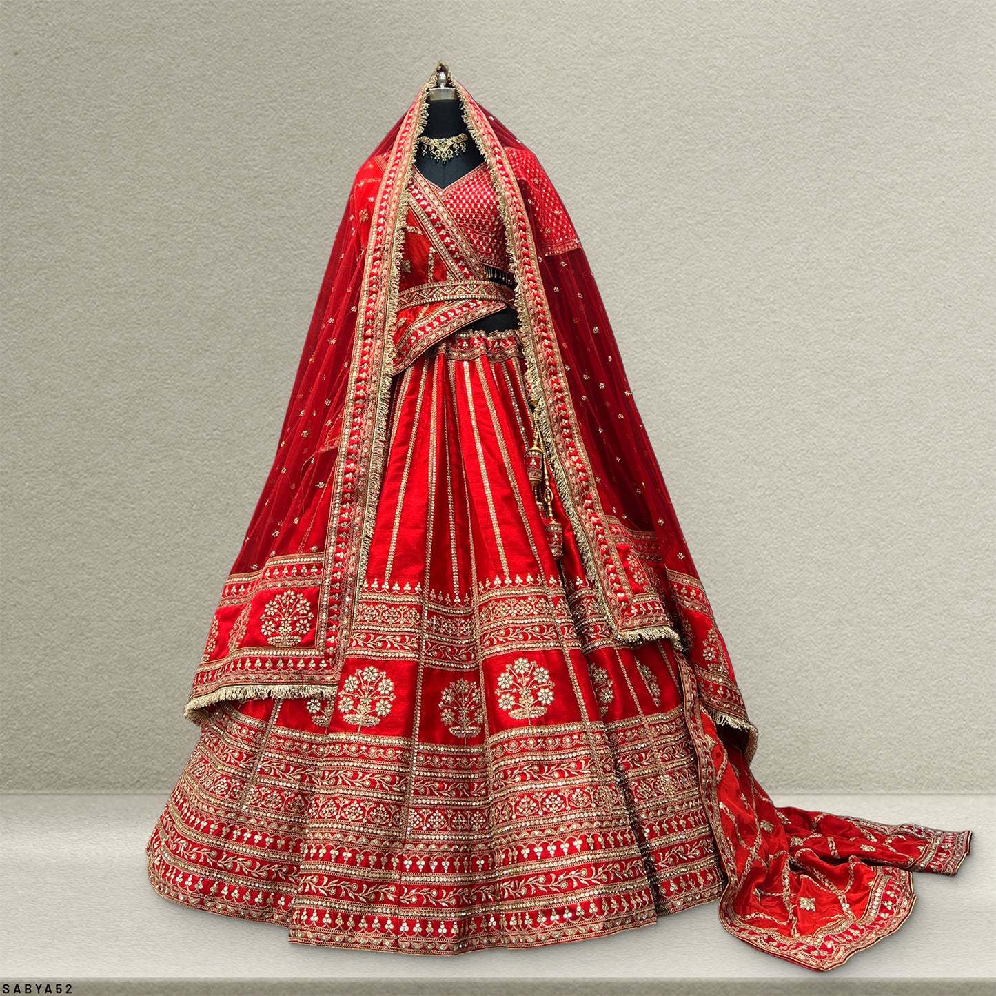 Dulhan in Red Lehenga Elegance: Double Dupatta Raw Silk Minimal Bridal Lehenga