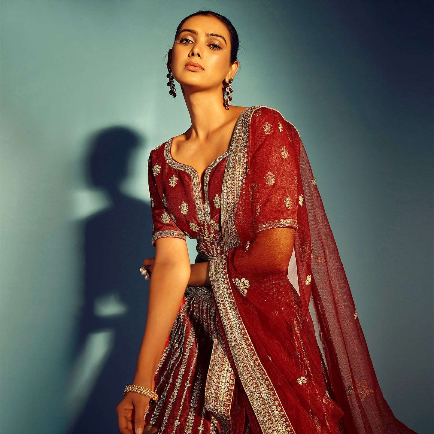 Dulhan in Maroon Lehenga : Celebrity-Inspired Royal Baggi Collection