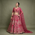 Royal Baggi Collection: Rani Pink Raw Silk Hand-Embroidered Designer Bridal Lehenga