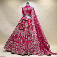 Pink bridal lehenga set with wide embroidered border and sheer dupatta