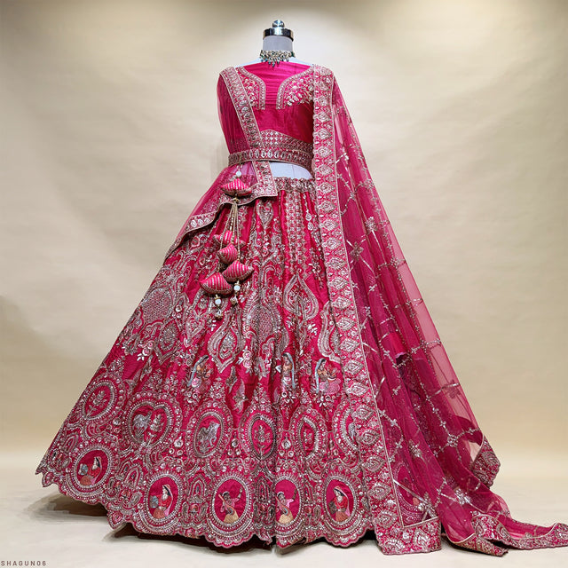 Pink bridal lehenga set with wide embroidered border and sheer dupatta