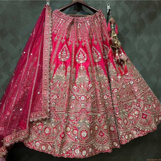 Fuchsia bridal lehenga skirt with heavy silver embroidery and beadwork border