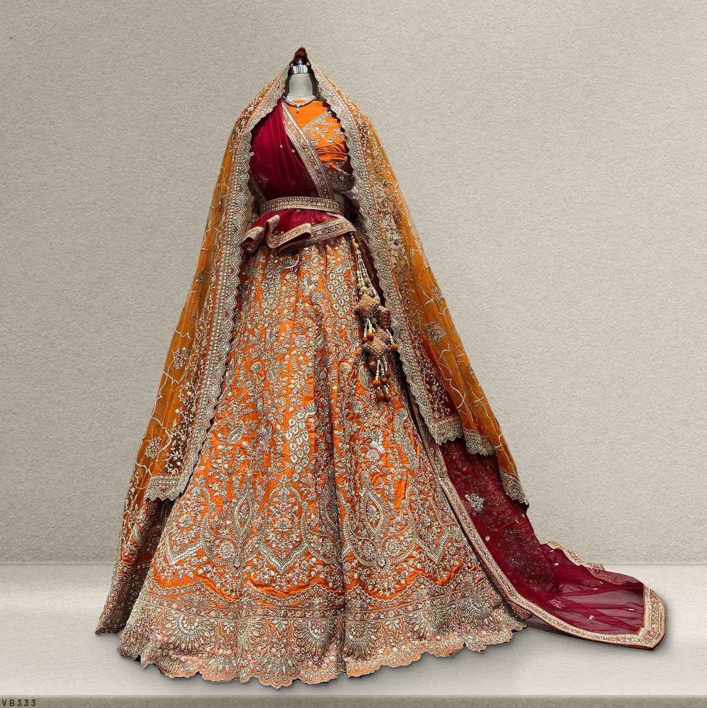 Dulhan in Orange Bridal Lehenga: Celebrity-Inspired Royal Baggi Collection