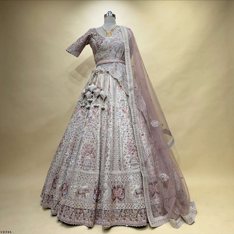 Pastel bridal lehenga set with patterned skirt, sequined trim, and sheer dupatta