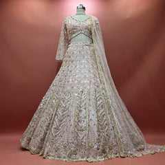 Soft blush designer lehenga with silver bead embroidery and sequin work
