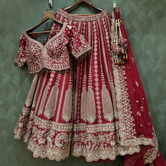 Maroon bridal lehenga skirt with gold zari motifs and matching double dupatta