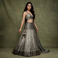 Grey tissue silk lehenga with black cutdana work, flared skirt and embroidered blouse