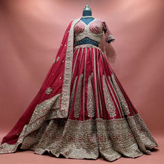 Maroon raw silk bridal lehenga with slim zari kalka panels, deep embroidered hem band, beaded blouse and double dupatta