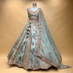 Embroidered multicolor lehenga with blouse and organza dupatta, back view on mannequin