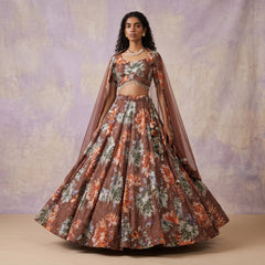 Mocha floral print lehenga with cropped blouse and sheer cape, flared skirt