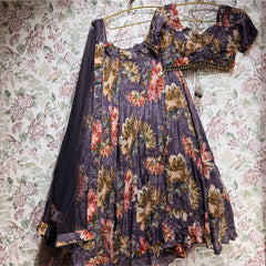 Purple floral printed crepe lehenga with embellished V-neck blouse and dupatta