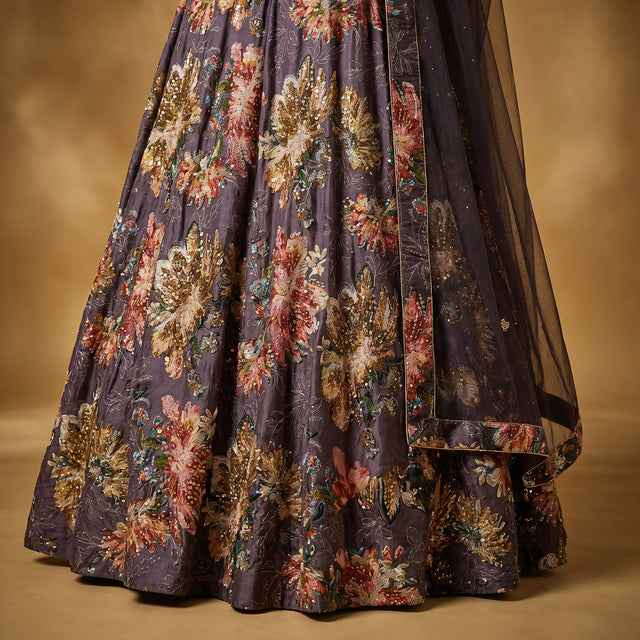 Dark purple floral printed lehenga skirt with gold and multicolor motifs
