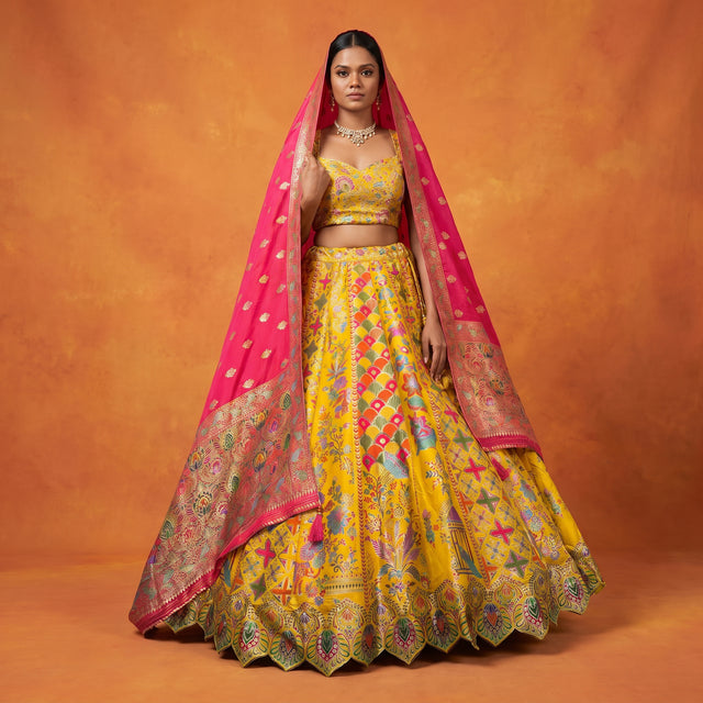 Multicolor silk lehenga set with yellow printed skirt, pink dupatta, short blouse